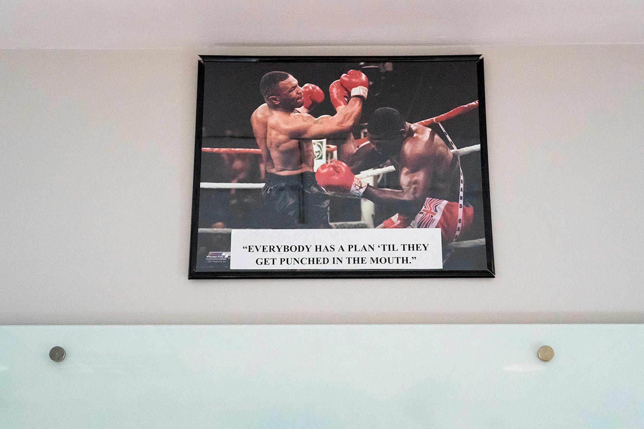 A photo of boxer Mike Tyson given to Myron Frans by Governor Dayton with a quote used by Frans in a tough hearing.
