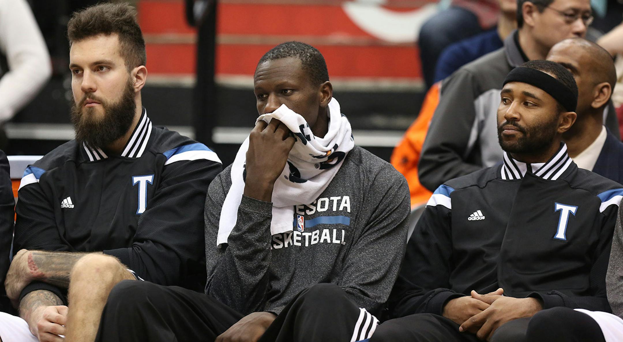 The Wolves Miroslav Raduljica, Gorgui Dieng and Mo Williams sat on the bench during the second half. ] (KYNDELL HARKNESS/STAR TRIBUNE) kyndell.harkness@startribune.com Timberwolves vs San Antonio at the Target Center in Minneapolis Min., Saturday, January 10, 2014. Spurs won over the Wolves 108-93.