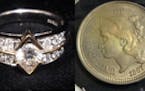This wedding ring and coin are among the lot of unclaimed goods the state will auction off online.