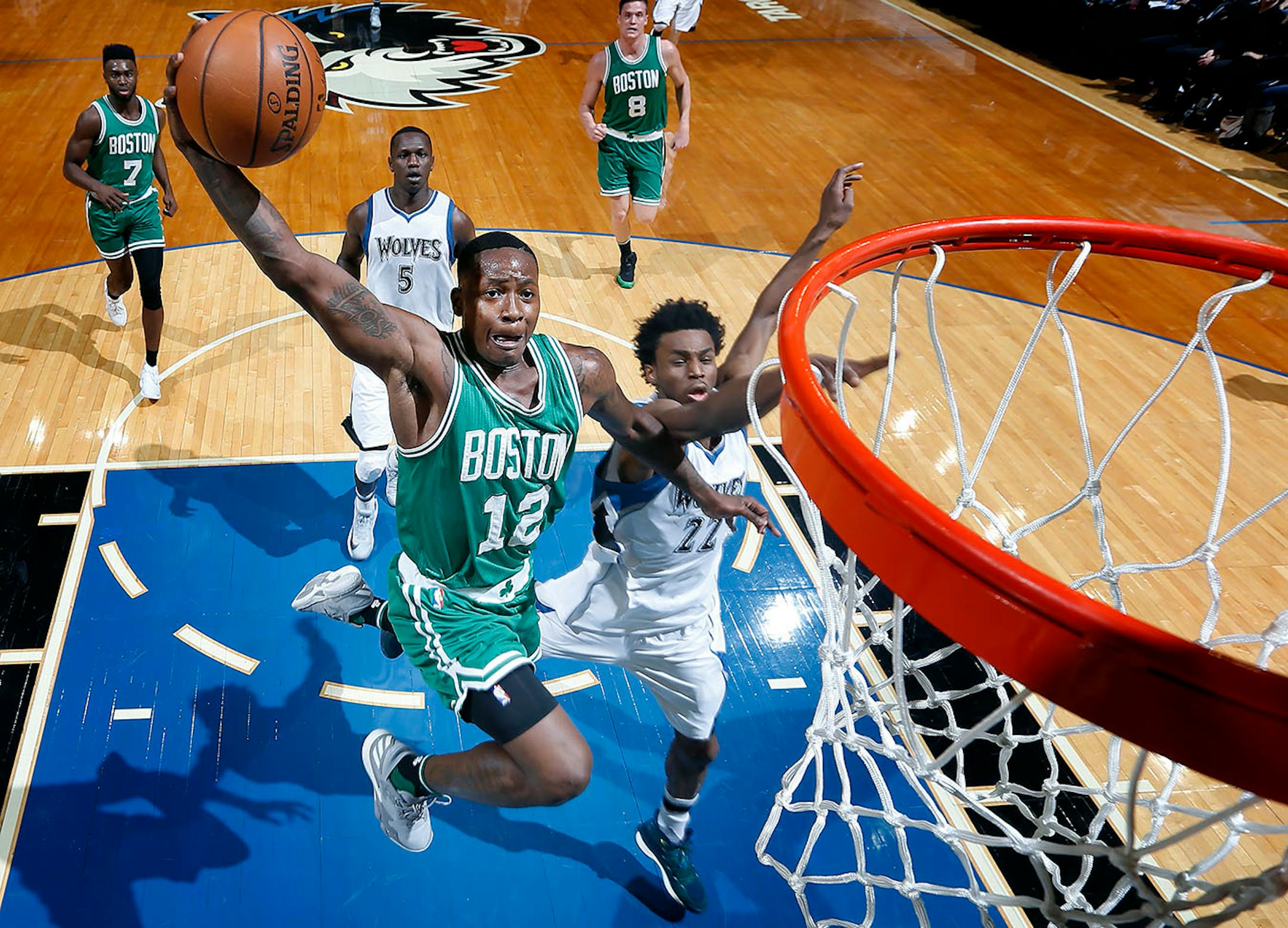 Terry Rozier (12) attempted a shot while being defended by defended by Andrew Wiggins (22) in the second half. ] CARLOS GONZALEZ cgonzalez@startribune.com - November 21, 2016, Minneapolis, MN, Target Center, NBA, Minnesota Timberwolves vs. Boston Celtics
