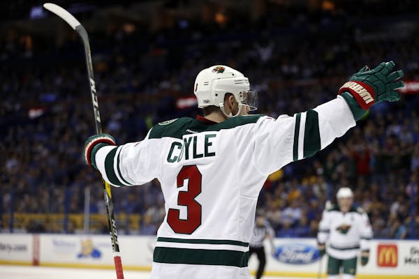 Charlie Coyle celebrated after scoring for the Wild on Wednesday night in St. Louis. Associated Press photo by Jeff Roberson