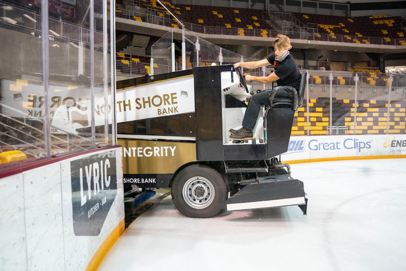 Sebastian Sullivan drove a Zamboni to resurface the ice in Amsoil Arena in Duluth on Thursday morning. ]