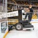 Sebastian Sullivan drove a Zamboni to resurface the ice in Amsoil Arena in Duluth on Thursday morning. ]