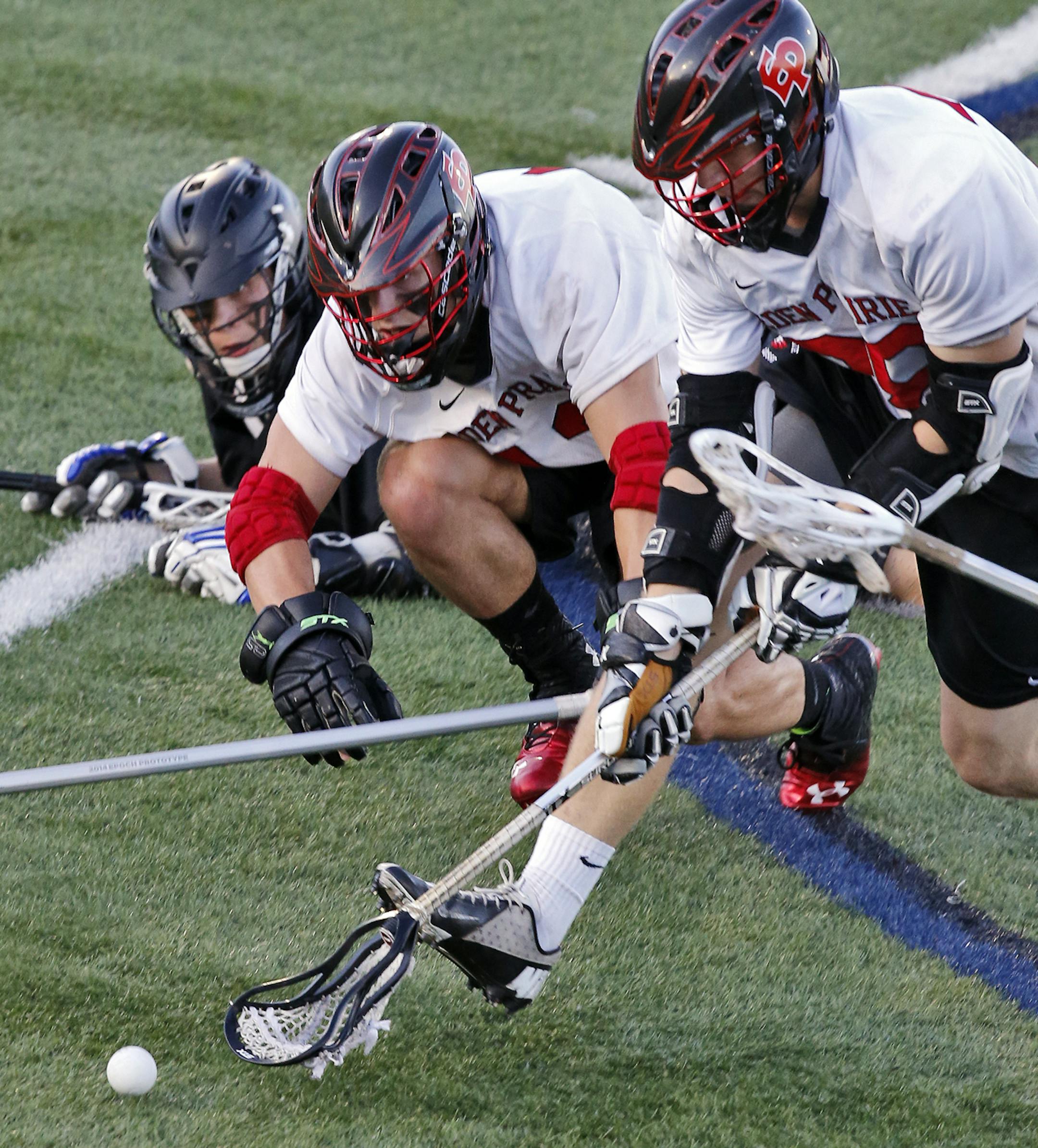 Boys lacrosse state championship game. Eastview vs. Eden Prairie. Both teams pursued a lose ball. (MARLIN LEVISON/STARTRIBUNE(mlevison@startribune.com (cq )