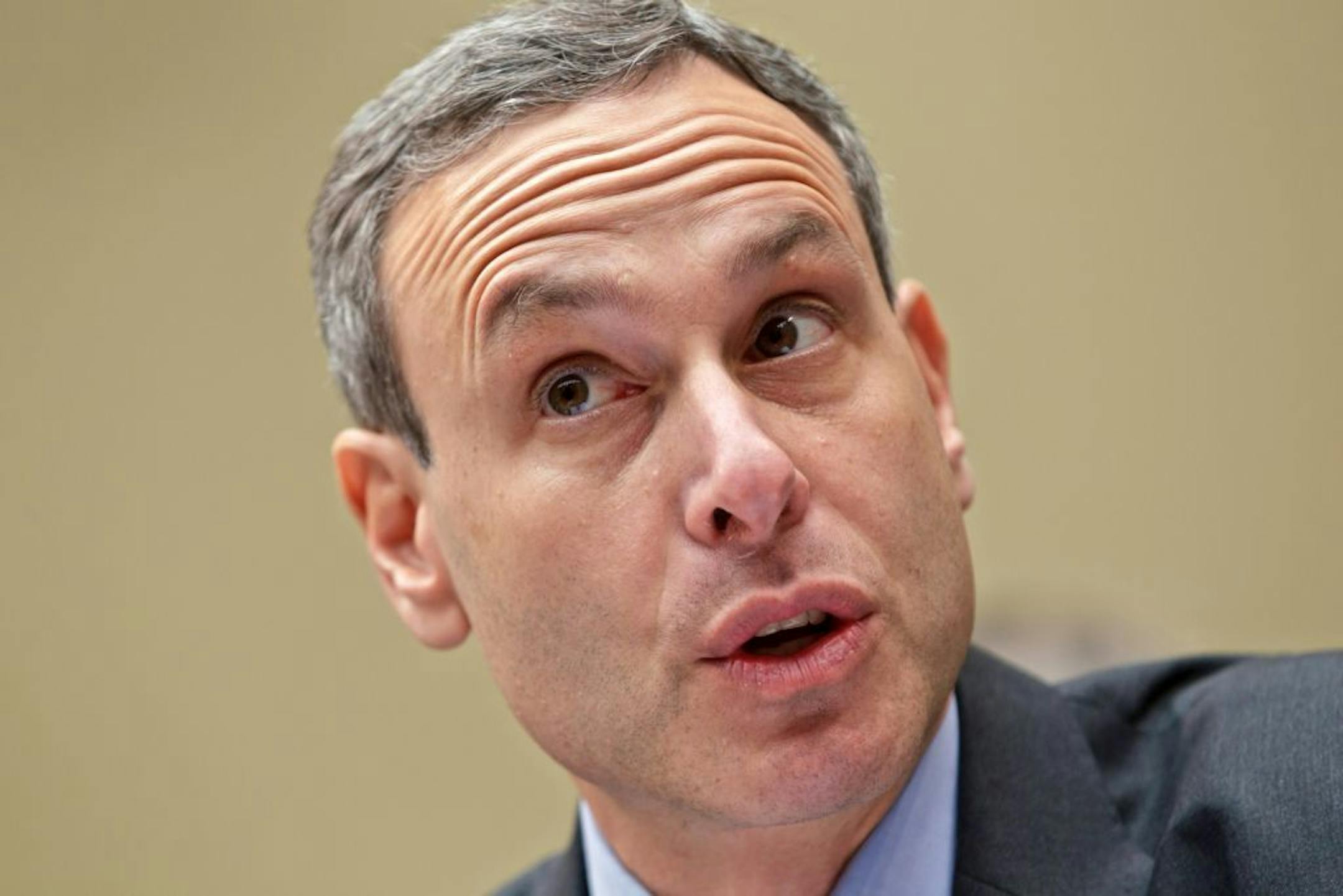 FILE - In this Aug. 2, 2012 file photo, Internal Revenue Service (IRS) Commissioner Douglas Shulman testifies on Capitol Hill in Washington, before the House Oversight Committee. The Internal Revenue Service inappropriately flagged conservative political groups for additional reviews during the 2012 election to see if they were violating their tax-exempt status, a top IRS official said Friday.