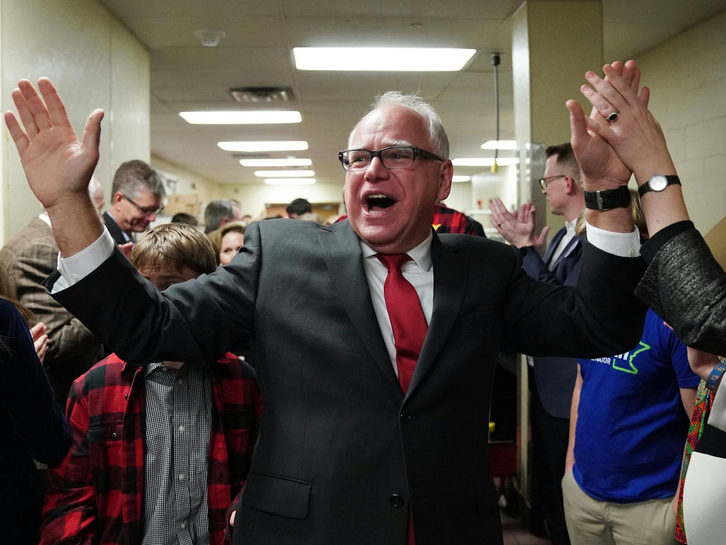 DFL gubernatorial candidate Tim Walz was congratulated by supporters as he was led through the kitchen to give a victory speech after his win. ] ANTHONY SOUFFLE &#xef; anthony.souffle@startribune.com Democratic-Farmer-Labor Party candidates, officials, and supporters gathered for an election night party Tuesday, Nov. 6, 2018 at the Intercontinental Hotel in downtown St. Paul, Minn.