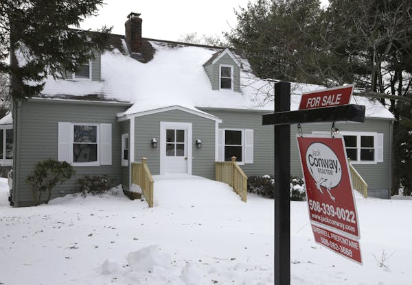 This Monday, Jan. 8, 2018, photo, shows an existing home for sale in Walpole, Mass. On Thursday, Feb. 1, 2018, Freddie Mac reports on the week&#xed;s 