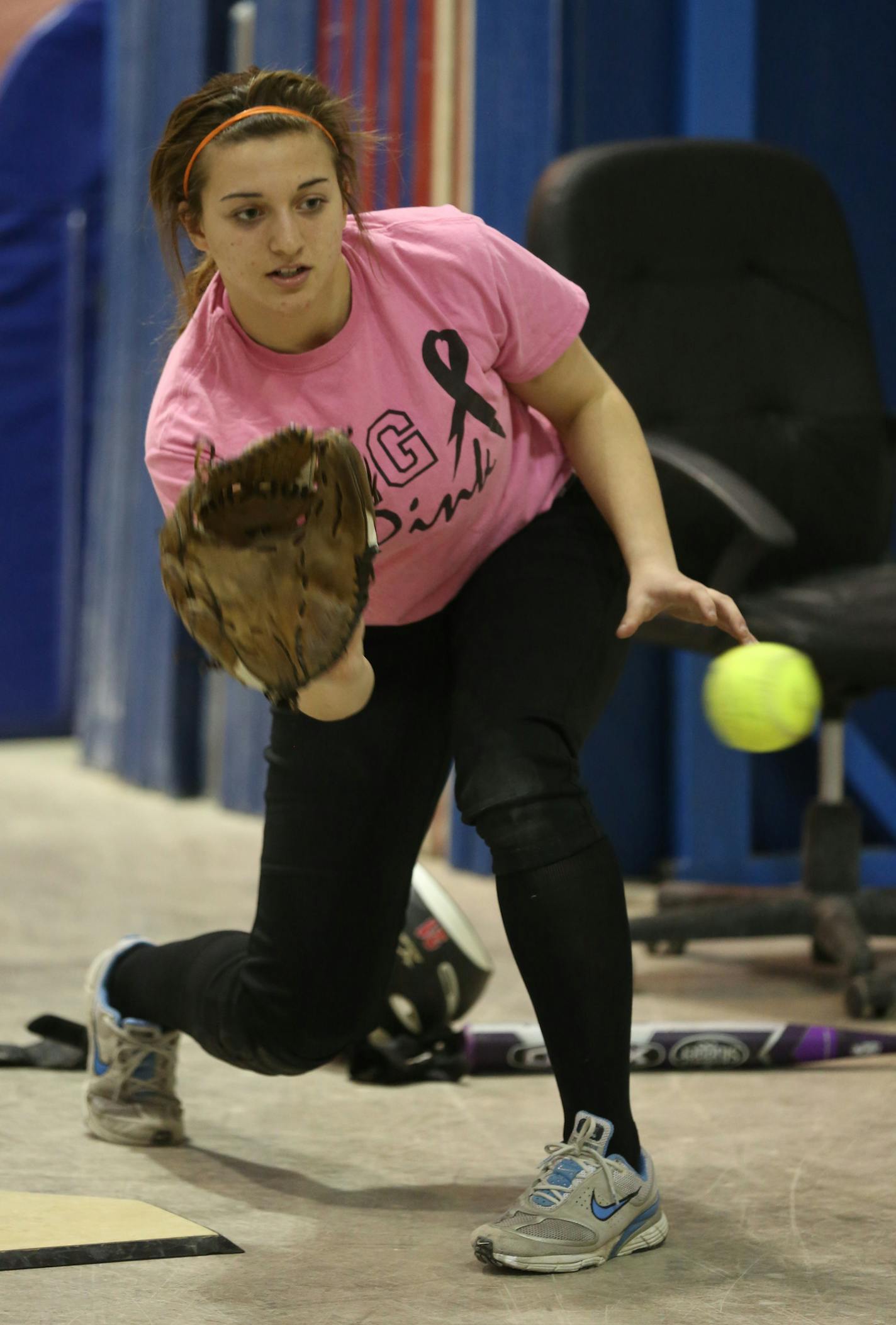 Jayme Langbehn prepared to catch the ball during practice. ] (KYNDELL HARKNESS/STAR TRIBUNE) kyndell.harkness@startribune.com Practice of the Elk River softball team that are defending Class 3A state softball champion in Elk River, Min, day, April 3, 2014.