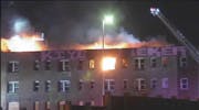 Fire burns at a vacant south Minneapolis apartment building on April 4, 2024