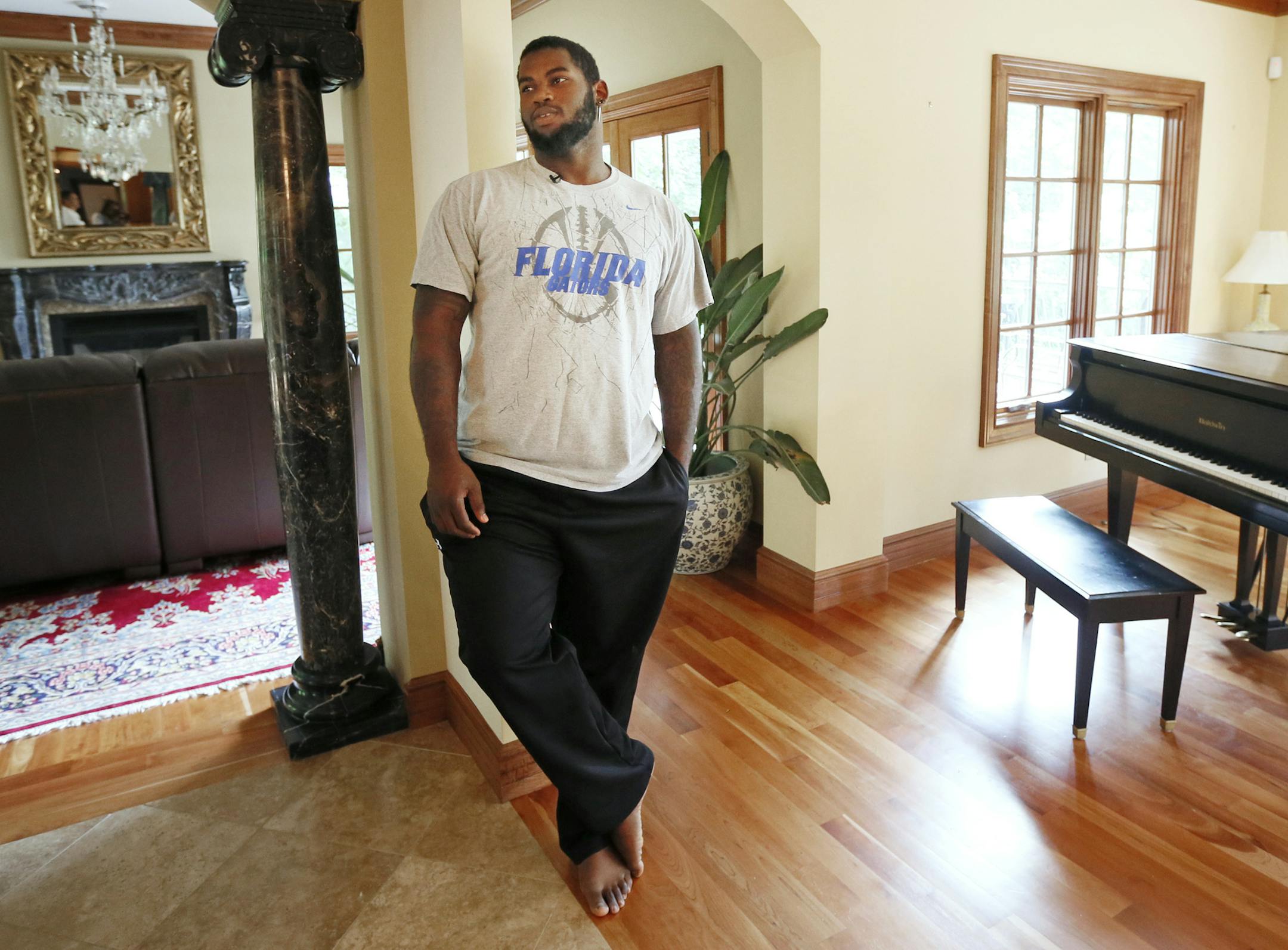 Sharrif Floyd relaxed at his new home in St. Louis Park before departing for Mankato. The explosive defensive tackle was the 23rd overall pick in the NFL draft.