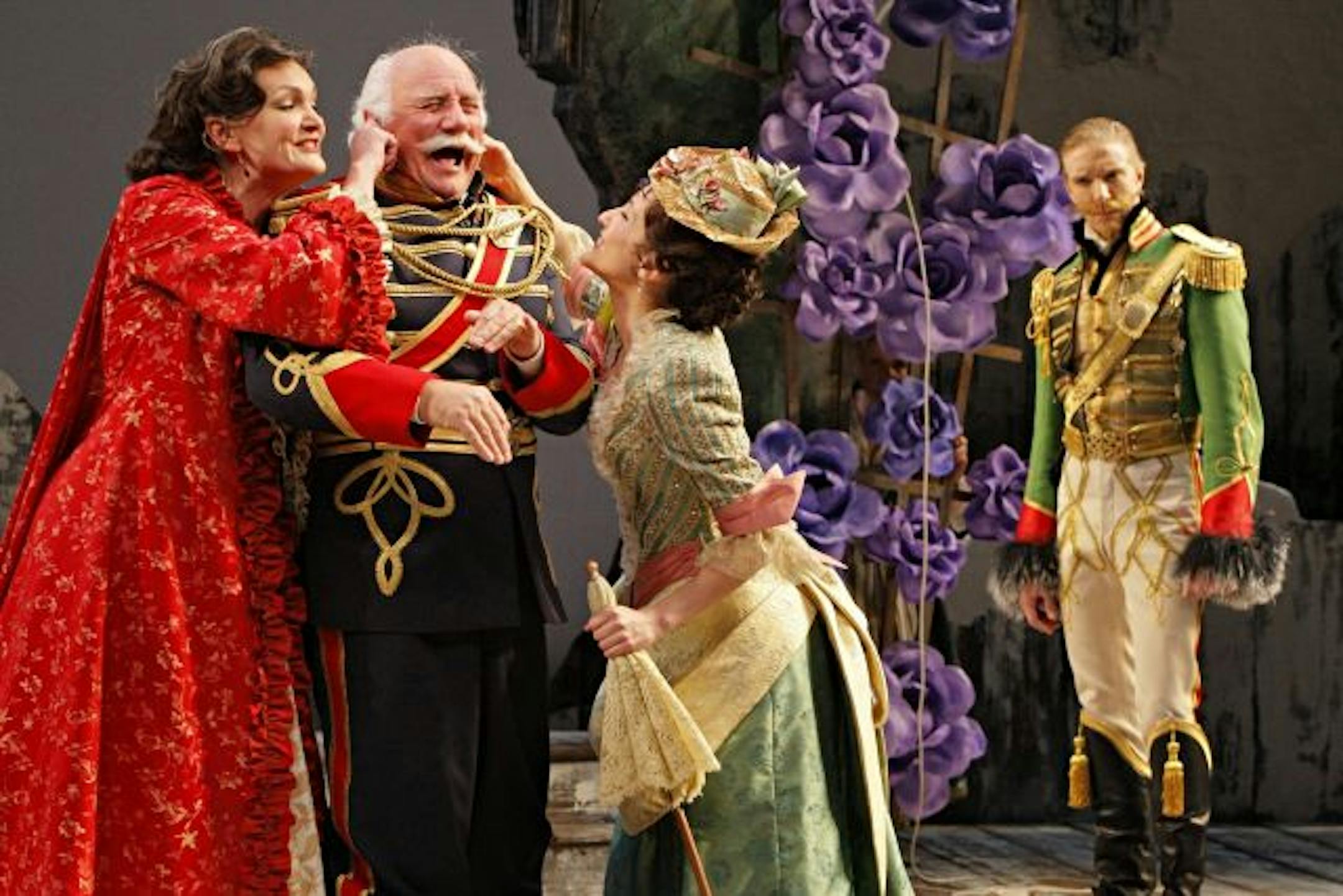 Kate Eifrig (Catherine Petkoff), Peter Michael Goetz (Major Paul Petkoff), Mariko Nakasone (Raina Petkoff) and Michael Schantz (Major Sergius Saranoff) in the Guthrie Theater production of "Arms and the Man."