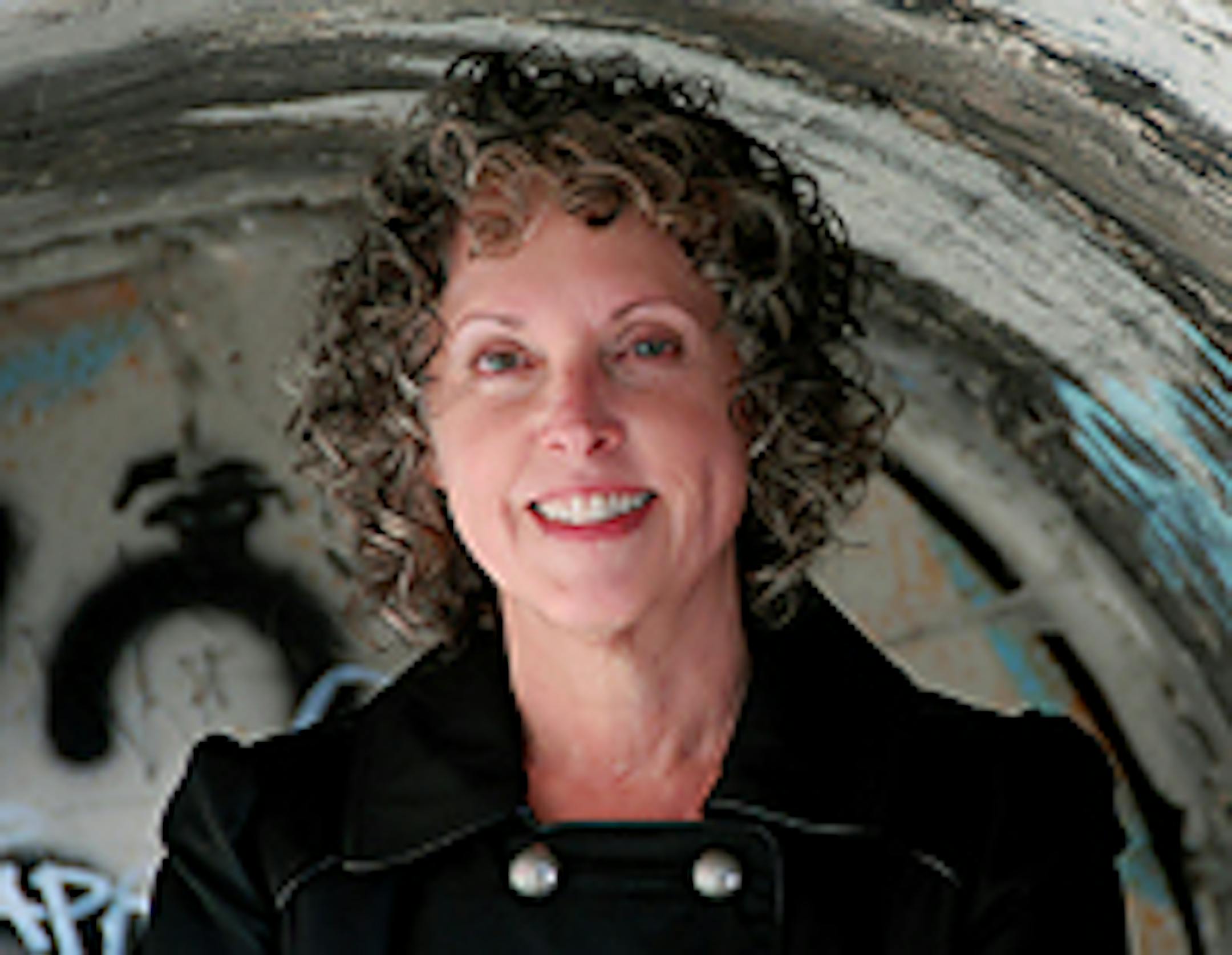 Theresa Weir near the base of the Stone Arch Bridge
