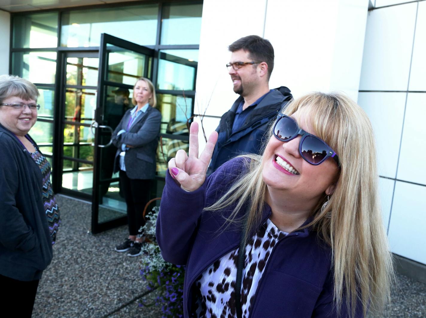 Super Prince fan Chris Skluzacek of Montgomery was the first off the bus carrying the first fans to get inside the new Paisley Park Tour and mugged before entering Paisley Thursday, Oct. 6, 2016, in Chanhassen, MN.