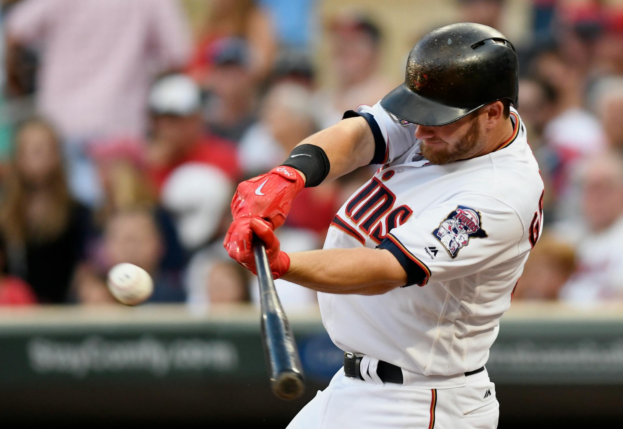 Minnesota Twins' Robbie Grossman hits an RBI doubble off Detroit Tigers pitcher Jordan Zimmermann during the third inning of a baseball game Saturday, July 22, 2017, in Minneapolis. (AP Photo/Tom Olmscheid)