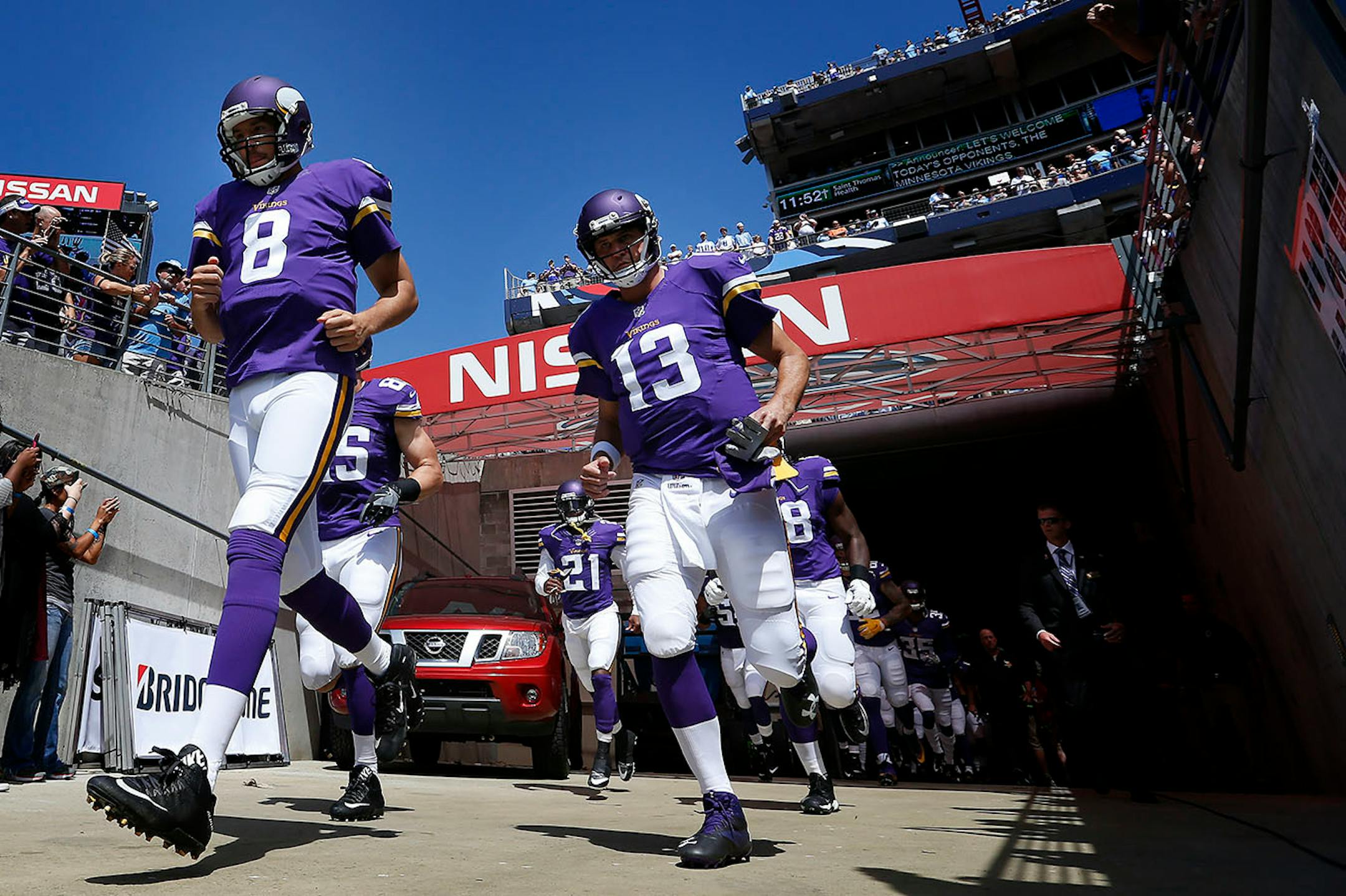 Minnesota Vikings quarterbacks Sam Bradford (8) and Shaun Hill (13) ran out during team introductions. ] CARLOS GONZALEZ cgonzalez@startribune.com - September 11, 2016, Nashville, TN, Nissan Stadium, NFL, Minnesota Vikings vs. Tennessee Titans