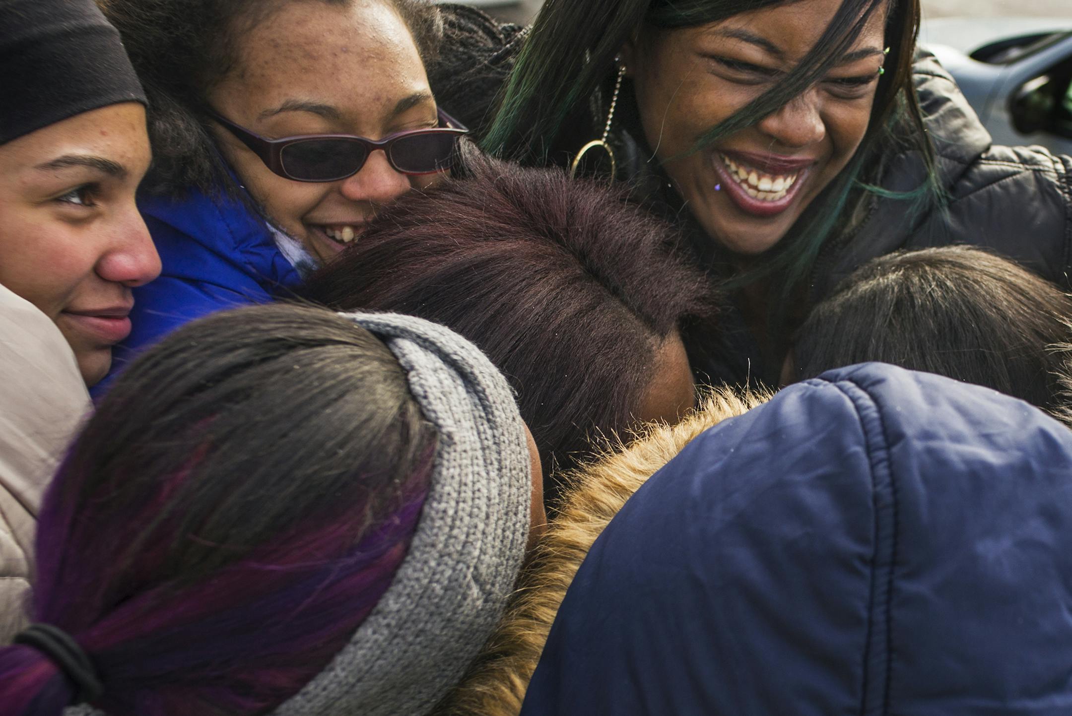 Rae'Chelle Hall,center, smiling, received a care package from students from the Black Student Leadership Council at Edison High School. Hall's baby, who is recuperating at HCMC, was beaten badly by her partner] rtsong-taatarii@startribune.com/ Richard Tsong-Taatarii
