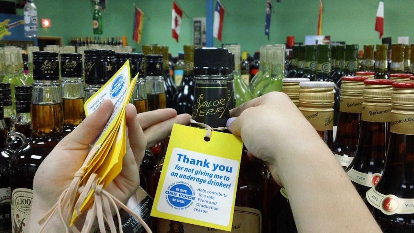 Hopkins High students stopped by seven Minnetonka and Hopkins liquor stores on April 25 to wrap tags around brands popular among teens. The tags had stickers on them thanking customers for not giving the alcohol to an underage drinker. The "Sticker Shock" tags will be in local liquor stores through mid-May.