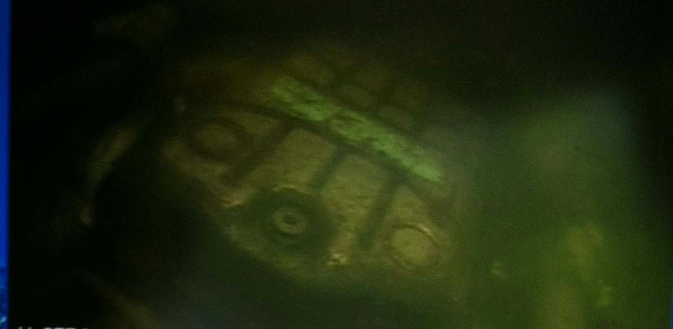 Sonar footage of a stolen BMW resting on its hood underwater in Loeb Lake in St. Paul.