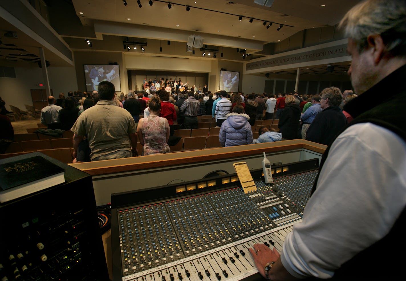 Curt Olsen controlled the sound board during a service at Bethlehem Baptist Church in Mounds View.