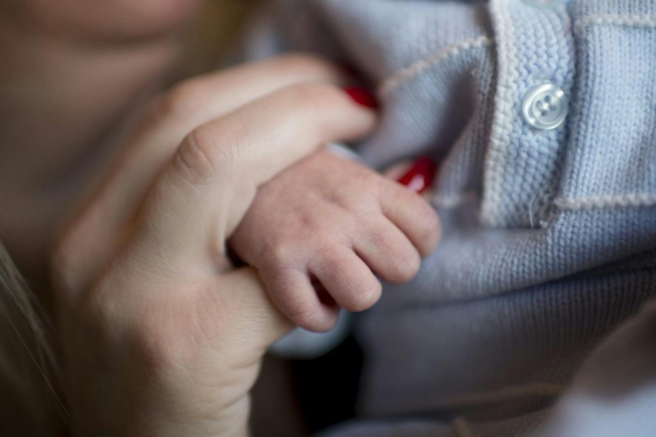 Tammy was happy to be home with Cody who got a fresh outfit and a new pair of socks. Tammy Van Dyke gave birth to her second son, Cody, on Monday Dec. 3. On Wednesday, shortly before she was to take him home, she learned there had been a mixup overnight - someone had put Cody in the wrong bassinet, and he had been wheeled to another mother (who had given birth to twins) and was breast-fed for a short time before the other woman noticed the baby's hospital ID had Tammy's name on it. Thursday, Dec