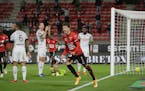 Forward Adrien Hunou of Rennes celebrates scoring the first goal during the League One soccer match between Rennes and Angers, at the Roazhon Park sta