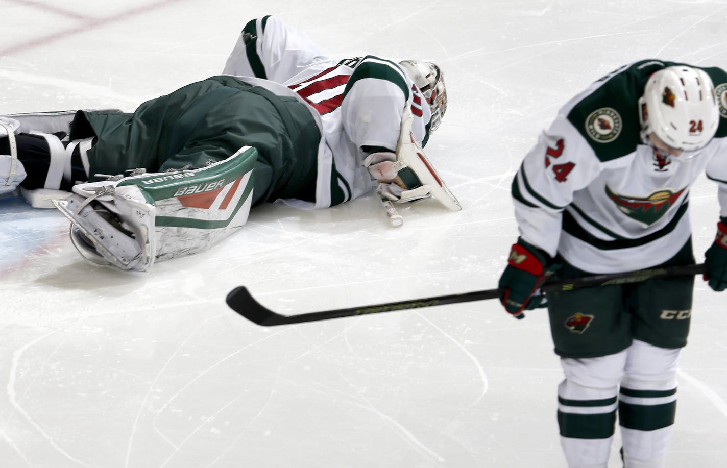 Wild goalie Devan Dubnyk (40) and Matt Dumba (24) after a goal by Antoine Roussel in the third period. ] CARLOS GONZALEZ &#xef; cgonzalez@startribune.com - December 21, 2015, St. Paul, MN, Xcel Energy Center, NHL, Minnesota Wild vs. Dallas Stars ORG XMIT: MIN1512212208480733