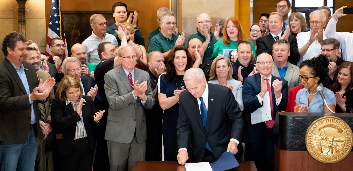 Surrounded by commissioners, legislators, workers, and retirees in the Capitol Rotunda, Gov. Mark Dayton signed the pension bill into law Thursday. The legislation reduces the state's pension fund liabilities and alleviates public workers' and retirees' fears that the retirement fund could eventually run short, which would hurt hundreds of thousands of Minnesotans. ] GLEN STUBBE &#xef; glen.stubbe@startribune.com Thursday, May 31, 2018 Surrounded by commissioners, legislators, workers, and retir