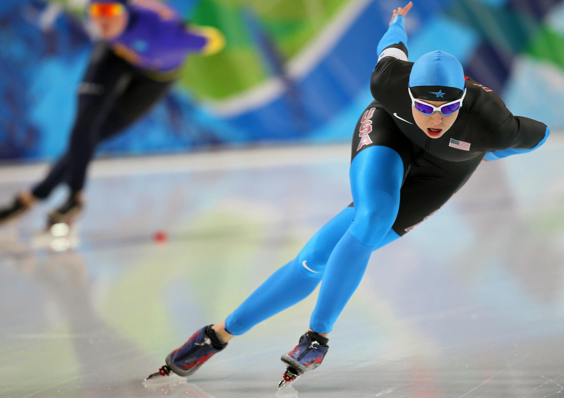 Apple Valley's Rebekah Bradford heads into the first turn of her 1000 meter speed skating race.