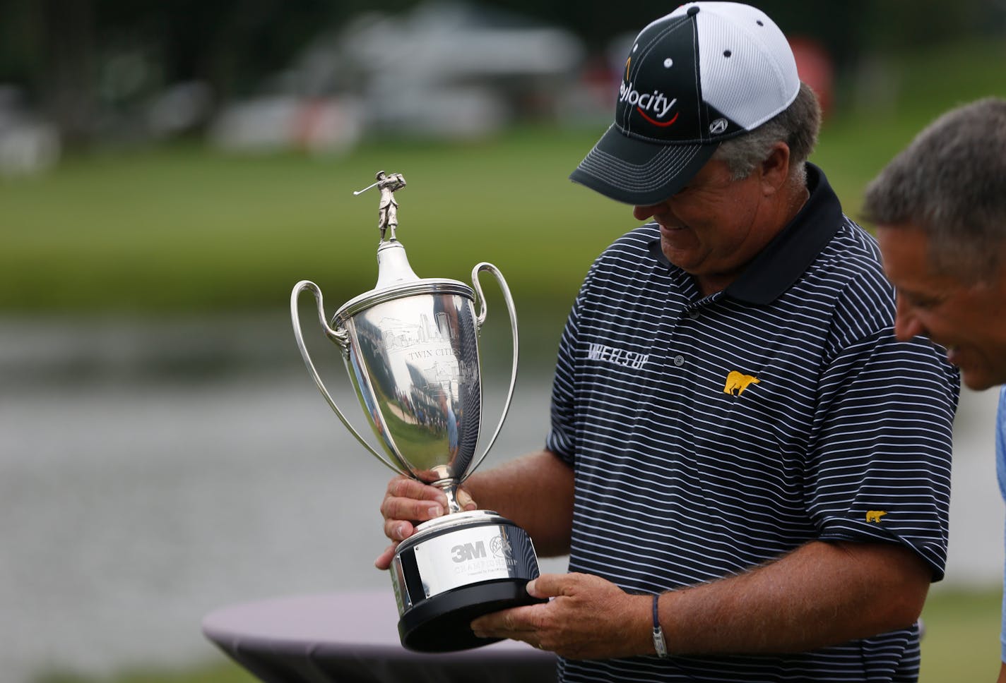 Kenny Perry looks at his trophy after winning the 2018 3M Championship with a total score of 195. ] ALEX KORMANN � alex.kormann@startribune.com The final day of the 3M Championship took place on Sunday August 5, 2018 at TPC Twin Cities. Kenny Perry led going into the final round and never relinquished that lead despite a strong performance from Wes Short Jr., who finished only three strokes behind.