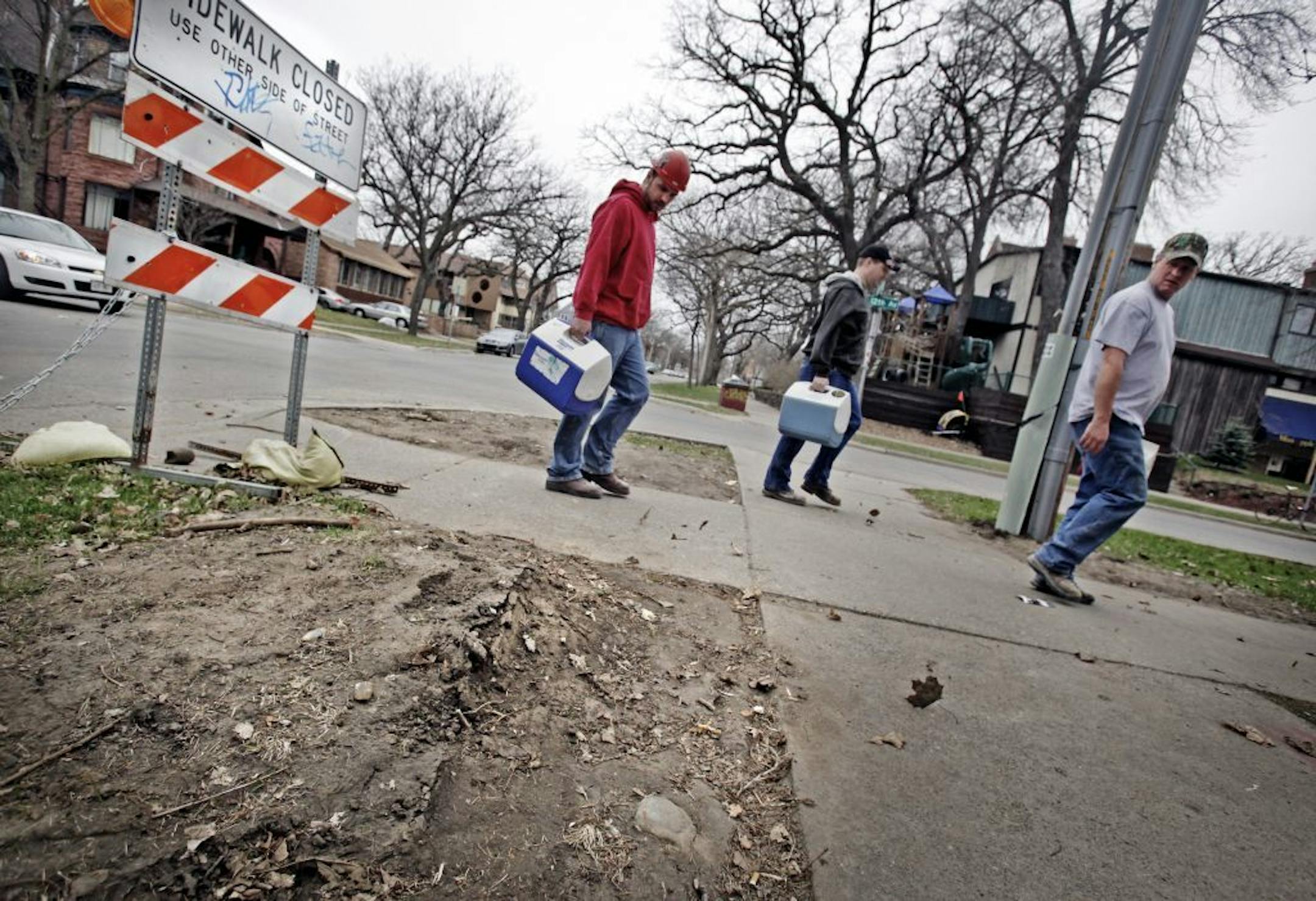 FILE -- A tire print from the vehicle was visible in the dirt at the corner of 5th Street and S.E. 12th Ave., where the three pedestrians were struck, sending one of them flying out into the middle of S.E. 12th. One of them later died.