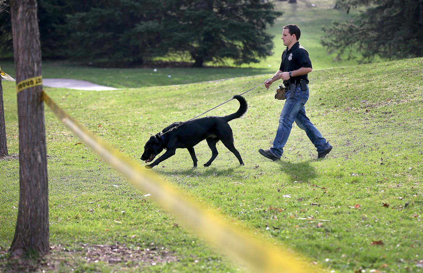 Investigators searched Indian Mounds Park Monday in St. Paul, where a man was shot to death Sunday night.