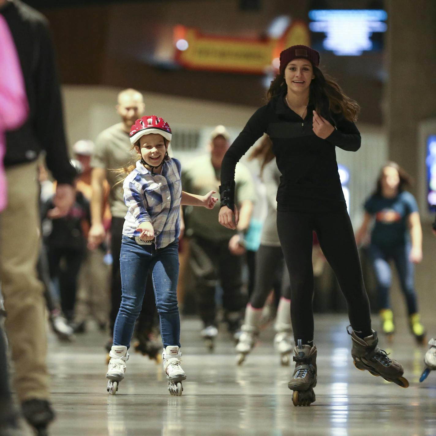 Skaters of all abilities rollered around the concourse of U.S. Bank Stadium Tuesday night. ] JEFF WHEELER &#xef; jeff.wheeler@startribune.com Inline skating has begun in the concourse of U.S. Bank Stadium with more dates added through March 2017 due to popular demand. Hundreds of people skated during the family period from 5- 7 p.m. Tuesday night, December 27, 2016.