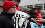 Nick Faber, president of the St. Paul Federation of Teachers, spoke at a Nov. 15 rally calling on CEOs to contribute as much to schools as the Super B