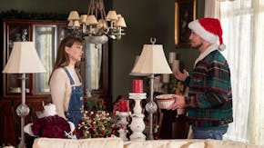 Leighton Meester and Robbie Amell in “EXmas.”