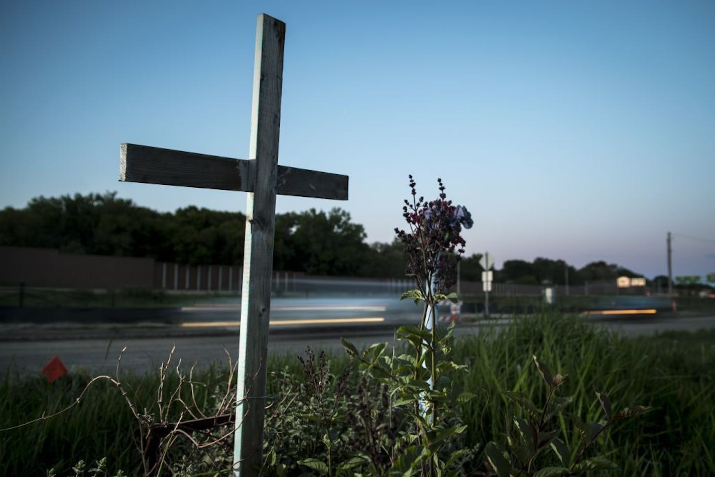 A road-side memorial for Gina Morri, who was run over by a dump truck several years ago near Country Drive and Spruce Street in Little Canada.