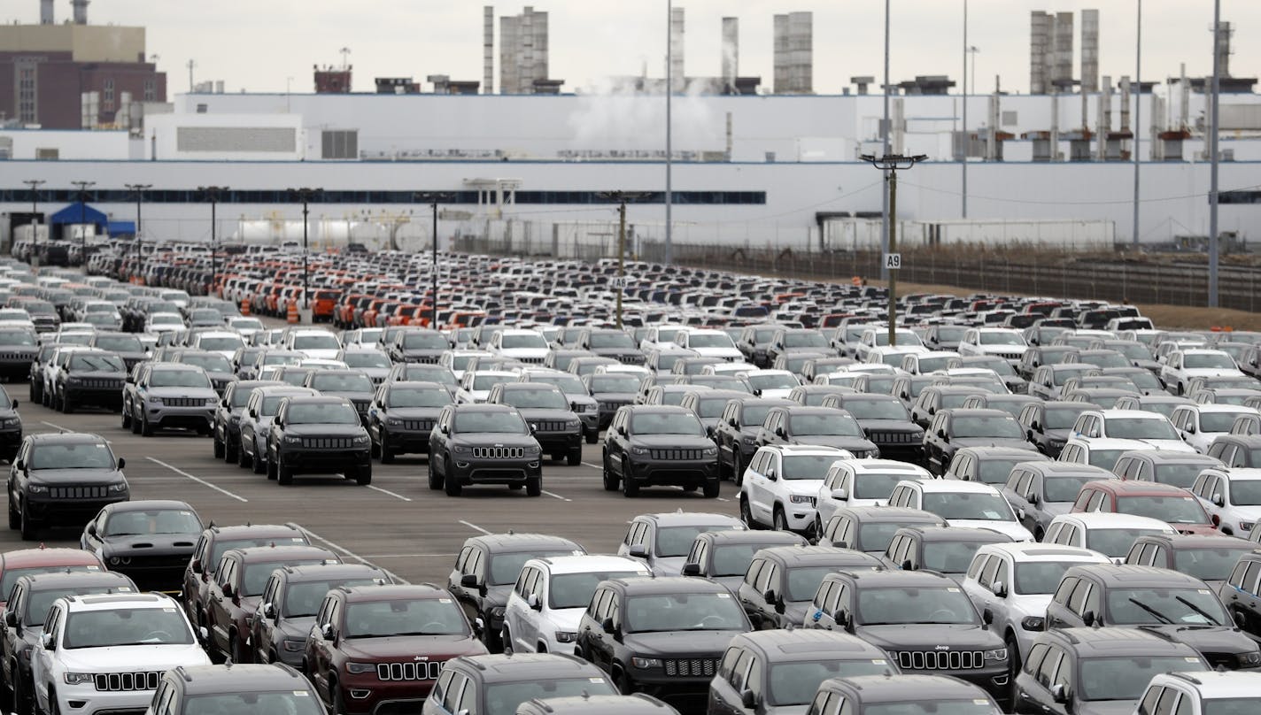 Sentiment perked up around Midwest factories during March, a monthly survey by Creighton University found. File photo of Jeep vehicles outside the Jefferson North Assembly Plant in Detroit in February.