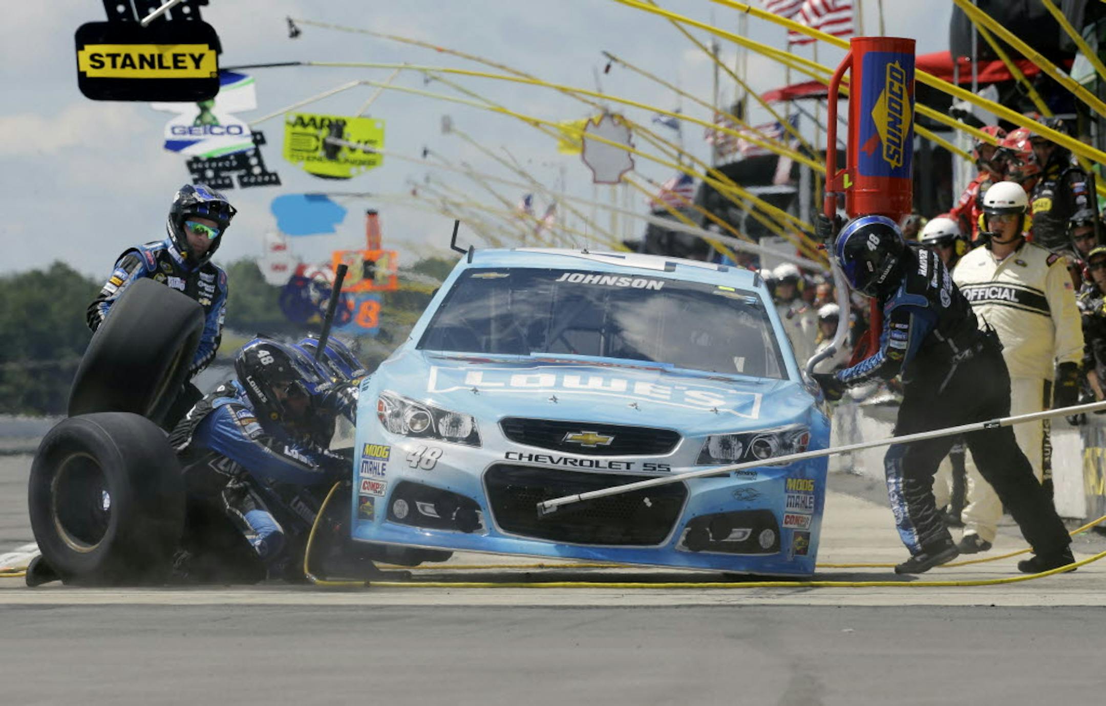 Jimmie Johnson makes a pit stop during Sunday's NASCAR Sprint Cup Series auto race.