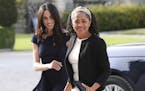 Meghan Markle, left and her mother, Doria Ragland, arrive at Cliveden House Hotel, in Berkshire, England, Friday, May 18, 2018 to spend the night befo