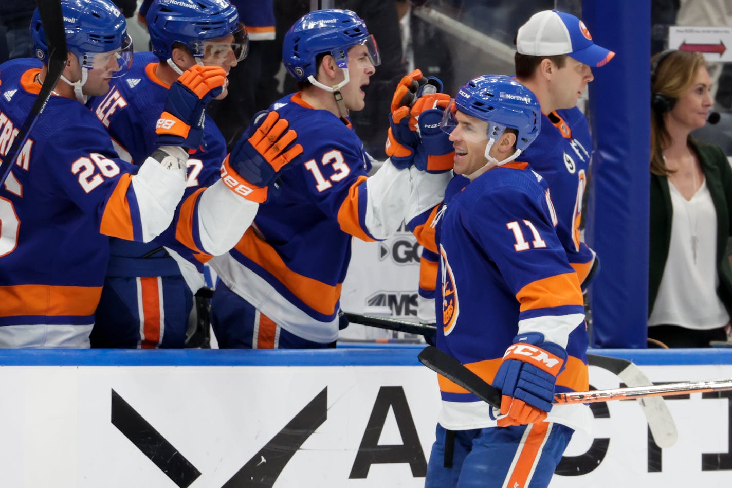 New York Islanders left wing Zach Parise (11) celebrates his goal during the third period of an NHL hockey game against the Philadelphia Flyers, Tuesday, Jan. 25, 2022, in Elmont, N.Y. (AP Photo/Corey Sipkin).