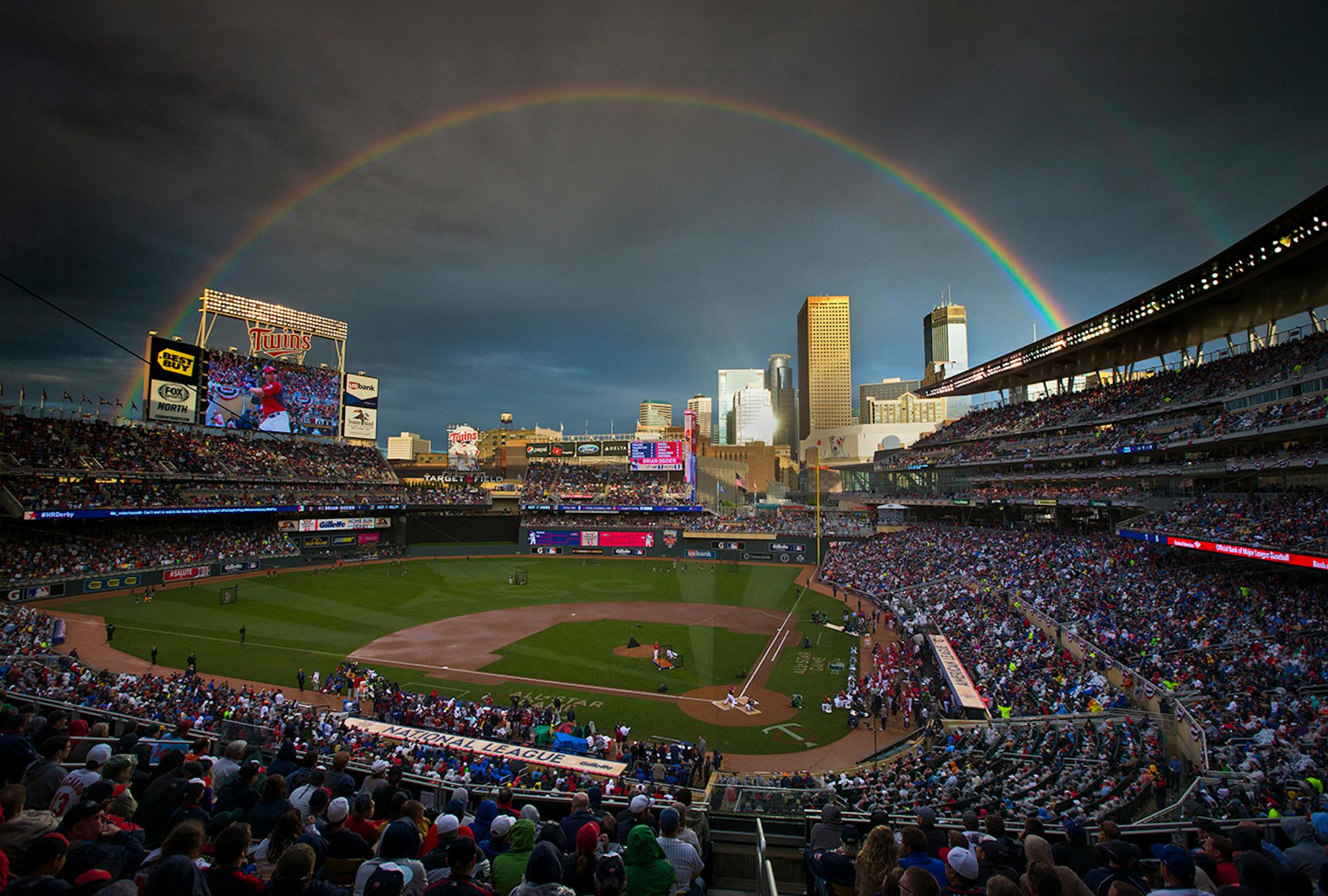 Those that waited out the rain delay were treated to a beautiful rainbow as Twins Brian Dozier took the plate in the Home Run Derby at Target Field. ] 2014 MLB All Star Game, Target Field BRIAN PETERSON • brian.peterson@startribune.com Minneapolis, MN 07/14/2014