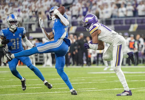 Lions safety Ifeatu Melifonwu (6) intercepts the pass intended for Vikings wide receiver Justin Jefferson (18) clenching the NFC title late in the fourth quarter at U.S. Bank Stadium, in Minneapolis, Minn., on Sunday, Dec. 24, 2023. ] Elizabeth Flores • liz.flores@startribune.com