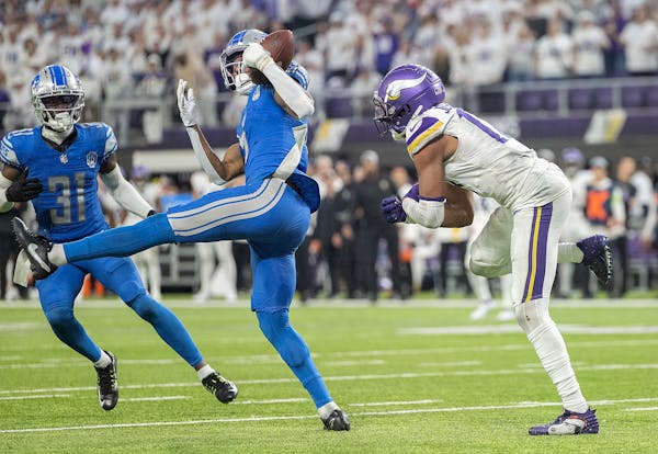 Lions safety Ifeatu Melifonwu (6) intercepts the pass intended for Vikings wide receiver Justin Jefferson (18) clenching the NFC title late in the fou