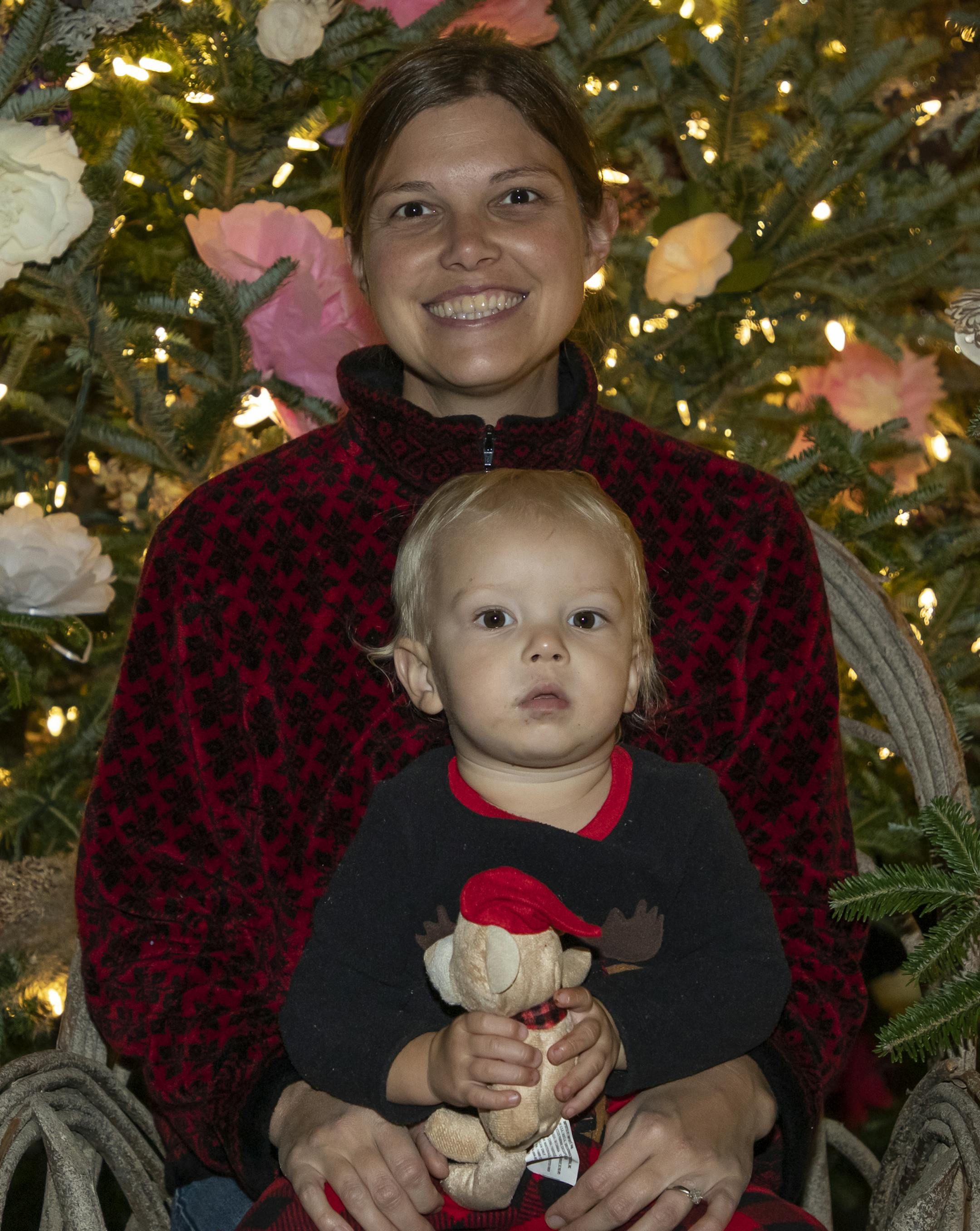 Alexander Whitteker and his mom, Elise, enjoy the tree lighting ceremony at the 2019 Winter in Bloom exhibit at the Minnesota Landscape Arboretum. [ Special to Star Tribune, photo by Matt Blewett, Matte B Photography, matt@mattebphoto.com, Minnesota Landscape Arboretum, Winter in Bloom, Minnesota, SAXO 1009874394 FACE120819 Alexander's mom, Elise Whitteker gave permission.