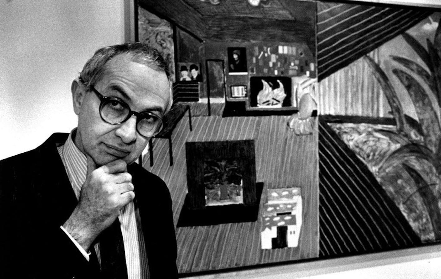 January 10, 1984 Martin Friedman in front of Hockney print.