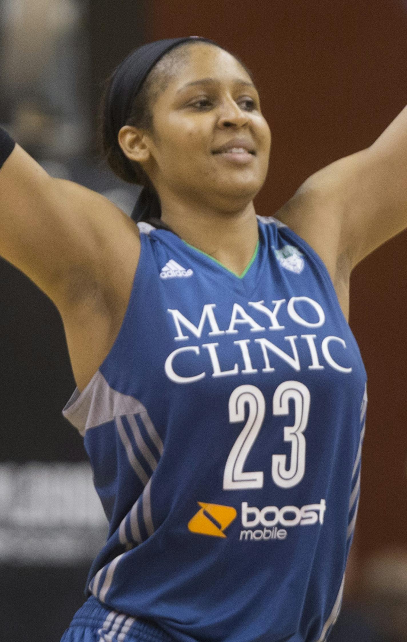 Lynx' Maya Moore (23) celebrates making a steal and game winning free throw against the Mercury during game 2 of the Western Conference Finals at Talking Stick Resort Arena in Phoenix, AZ on September 27, 2015.