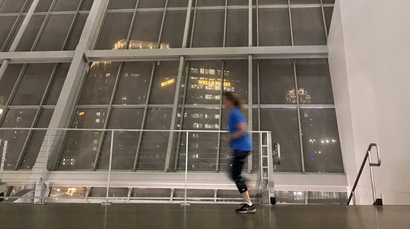 A runner zips along the upper concourse of U.S. Bank Stadium during the Dec. 9 Winter Warm-Up, when the stadium opens to runners and inline skaters.