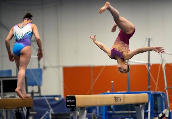 Minnesota Olympic hopeful Sun Lee practiced Friday at Midwest Gymnastics Center in Little Canada. ]
