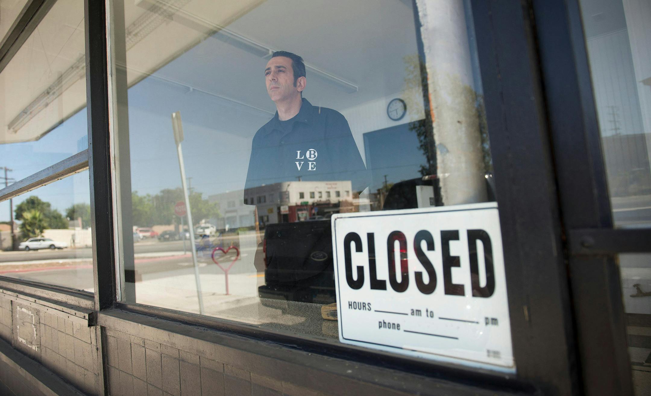 Jeff Terranova looks out the window of his failed Long Beach Vegan Eatery in Long Beach, Calif. Terranova had financial struggles in keeping the establishment and says bad reviews on Yelp contributed to his woes. Some restaurant owners have complained of malicious reviews from competitors and lack of support from Yelp in removing unfair ratings. (Josh Morgan/Orange County Register/MCT) ORG XMIT: 1145479