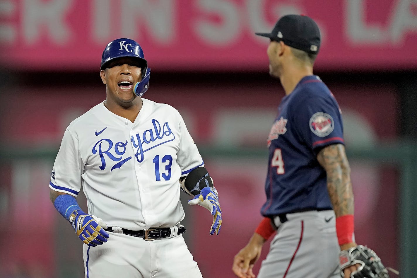 Kansas City Royals' Salvador Perez (13) celebrates on second after hitting an RBI double during the first inning of a baseball game against the Minnesota Twins Wednesday, Sept. 21, 2022, in Kansas City, Mo. (AP Photo/Charlie Riedel)