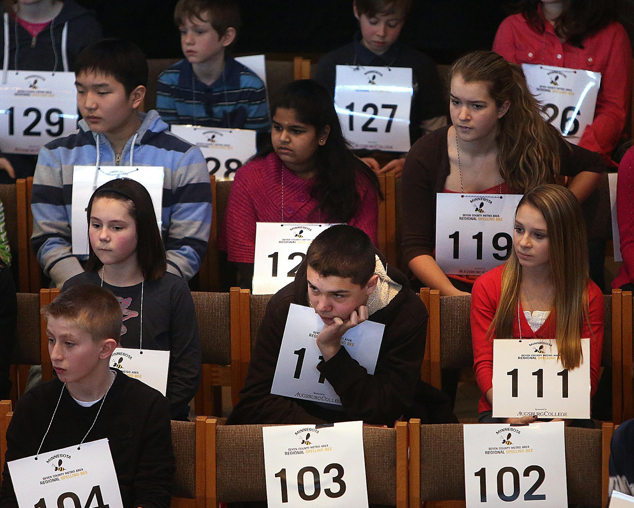 Contestants, including Antonio Flores, Valley View Middle School (middle, #112), waited for their turn to compete in the opening round of the Seven County Metro Area Regional Spelling Bee.] JIM GEHRZ•jgehrz@startribune.com (JIM GEHRZ/STAR TRIBUNE) / March 2, 2012 / 11:30 AM Minneapolis, MN- BACKGROUND INFORMATION: Middle and junior high school students gathered at Hoversten Chapel on the Augsburg College campus to compete in the Seven County Metro Area Regional Spelling Bee. The winner ad